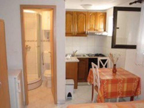 Kuchyň nebo kuchyňský kout v ubytování Apartment Marija