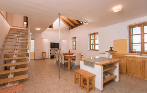 Kuchyň nebo kuchyňský kout v ubytování Holiday Home Podobuce Bb Iii