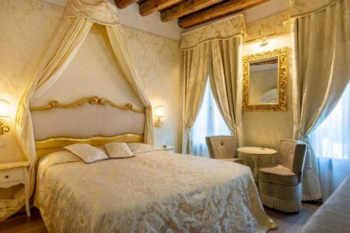 Postel nebo postele na pokoji v ubytování B&B Patatina