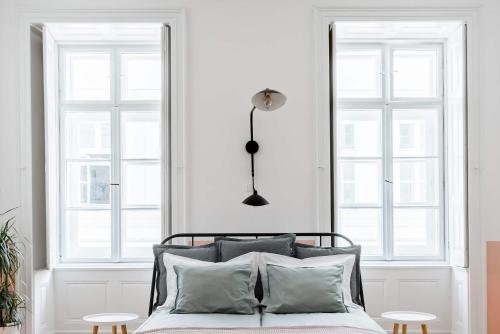 Posteľ alebo postele v izbe v ubytovaní Herbarium Apartment