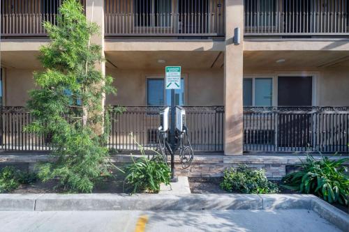 a bike parked in front of a building at Days Inn by Wyndham Galt - Elk Grove South in Galt