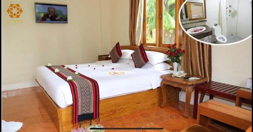 Ein Bett oder Betten in einem Zimmer der Unterkunft The Hotel Umbra Bagan