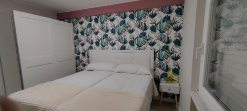 מיטה או מיטות בחדר ב-Los Sitios