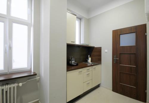 Dapur atau dapur kecil di Apartamenty Weneckie