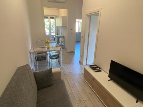 TV a/nebo společenská místnost v ubytování M.G Home a un passo da tutto