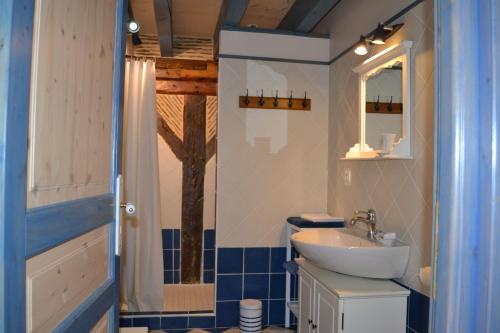 Koupelna v ubytování Chambres d'Hôtes Le Moulin à Epices