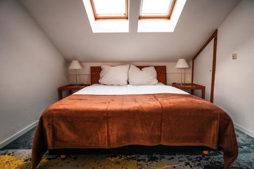 Postel nebo postele na pokoji v ubytování VISITALPS moderne Ferienwohnung nähe München u Salzburg