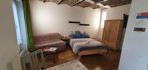 En eller flere senger på et rom på Au Petivall Studio