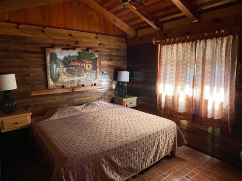 Un pat sau paturi într-o cameră la La Huerta