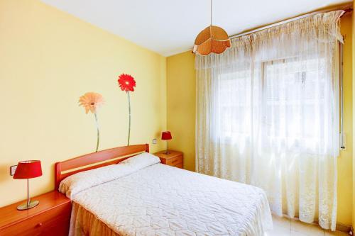 Voodi või voodid majutusasutuse Puig Rom 115 Roses - Immo Barneda toas