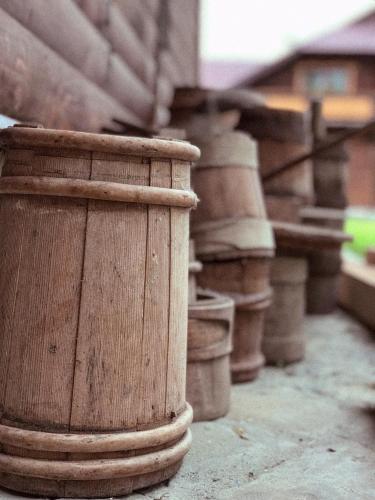a group of wooden containers sitting next to each other at Чорногірський Вітер in Verkhovyna