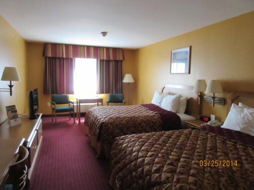 Ένα ή περισσότερα κρεβάτια σε δωμάτιο στο Parkfield Inn - Warsaw