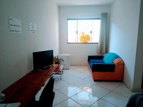 Μια τηλεόραση ή/και κέντρο ψυχαγωγίας στο Minha casa pousada