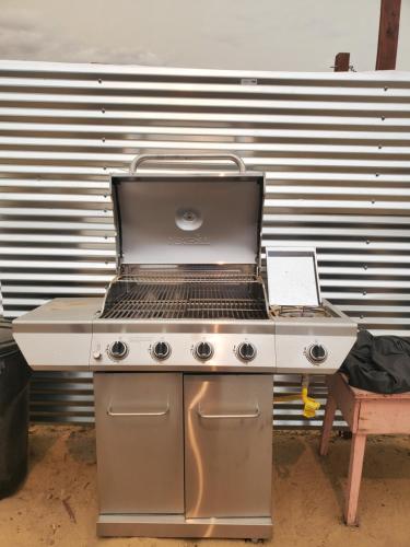 a grill with a laptop sitting on top of it at The Kosmic Tortoise in Twentynine Palms