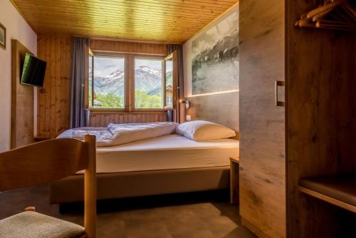 Katil atau katil-katil dalam bilik di Hotel Walser