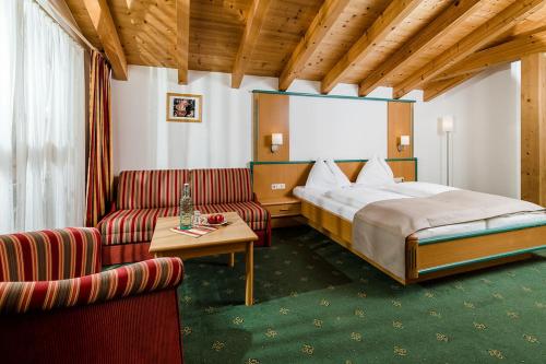 Postel nebo postele na pokoji v ubytování Hotel Langeck
