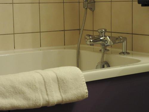 Koupelna v ubytování Au Bon Gîte