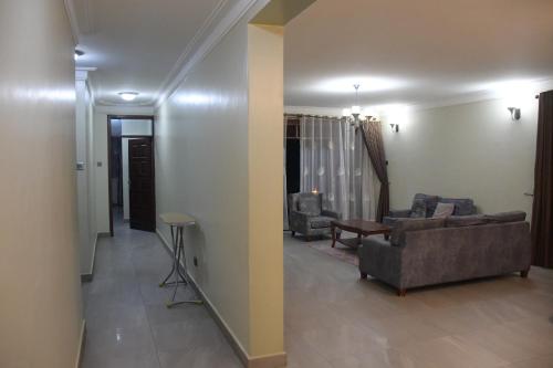 Χώρος καθιστικού στο Munyonyo Heights Apartments