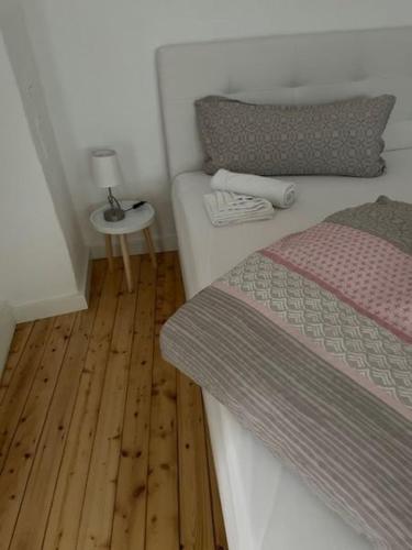 Katil atau katil-katil dalam bilik di Ferienhaus am Fallertor