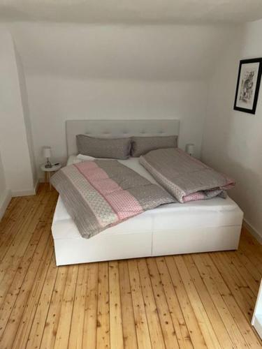 Katil atau katil-katil dalam bilik di Ferienhaus am Fallertor