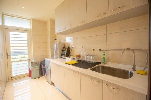 Kuchyň nebo kuchyňský kout v ubytování 雅舍 Arthur Hostel