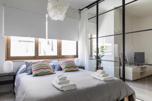 Posteľ alebo postele v izbe v ubytovaní Loft en el corazón de Valencia