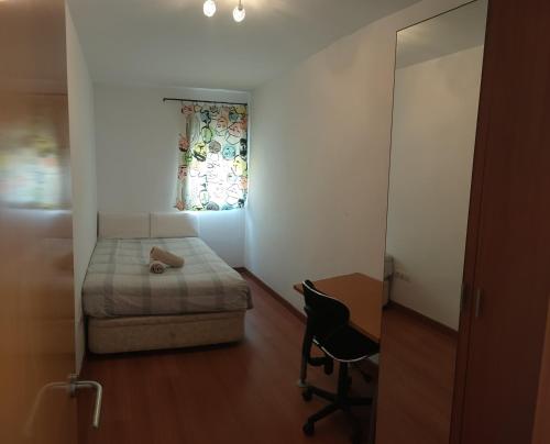 Postel nebo postele na pokoji v ubytování Malaga Rivas