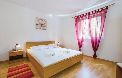 Posteľ alebo postele v izbe v ubytovaní Apartman Nina 2