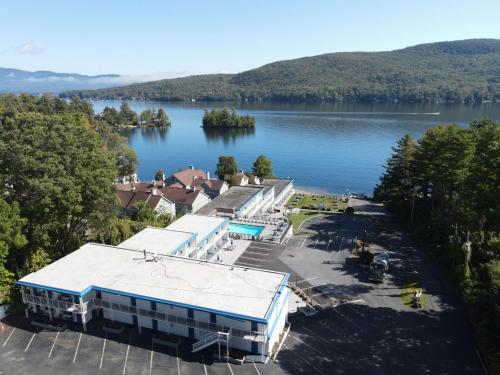 an aerial view of a resort on a lake at Lakefront Terrace Resort in Lake George