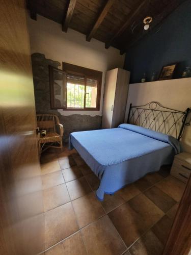 Posteľ alebo postele v izbe v ubytovaní Casa Rural Canchal Madroñeras ***