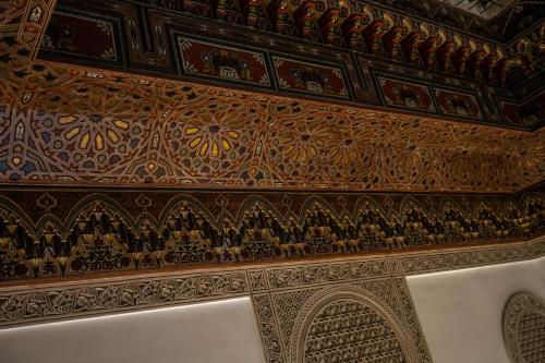 an ornate ceiling of a room in a building at Riad Sidrat Fes in Fès