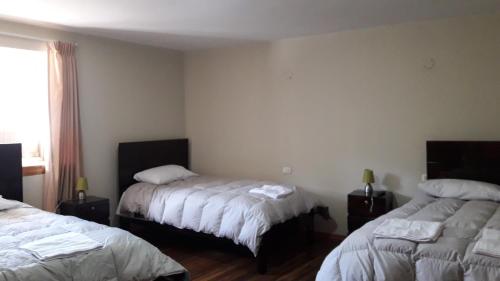 Cama o camas de una habitación en Arcopata Apartamentos