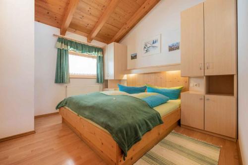 Posteľ alebo postele v izbe v ubytovaní Ferienhaus Artho