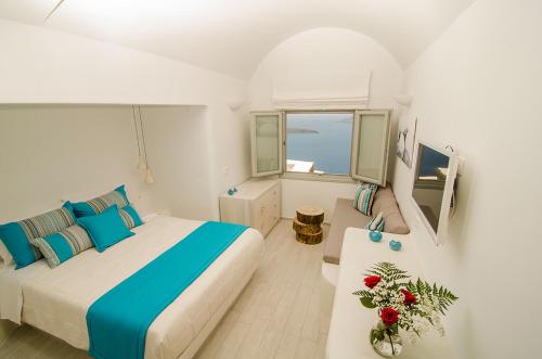 Ένα ή περισσότερα κρεβάτια σε δωμάτιο στο Aerino Villa