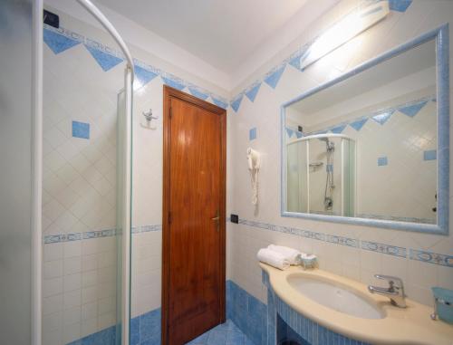 Ванная комната в Hotel Casa del Sole