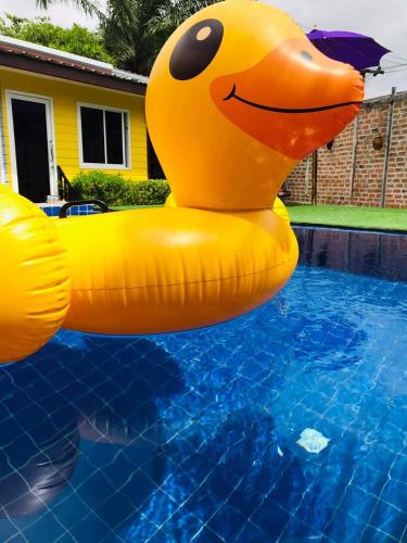 an inflatable rubber duck in a swimming pool at At Thara Aonang in Ao Nang Beach