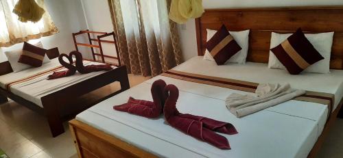 Treasure House Tourist Restにあるベッド