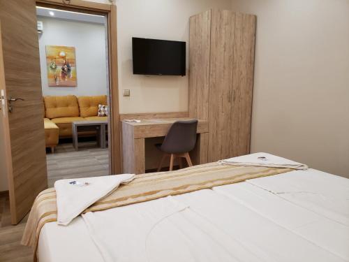 Katil atau katil-katil dalam bilik di Perla Apartments First Line