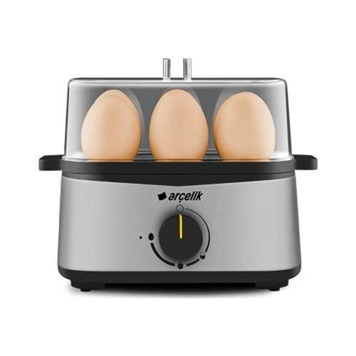 a toaster with three eggs on top of it at Duru Sultanahmet Apart & Suites in Istanbul