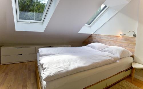 Katil atau katil-katil dalam bilik di Apartament Dwupoziomowy z Sauną - Apartamentuj
