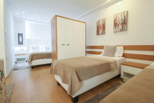Una cama o camas en una habitación de Gardenia Hotel & Spa