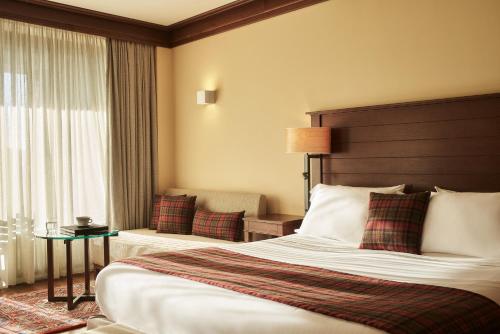 Grand Forest Metsovo - Leading Hotels of the Worldにあるベッド