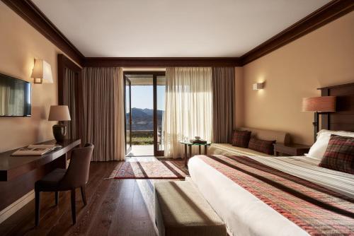 Grand Forest Metsovo - Leading Hotels of the Worldにあるベッド