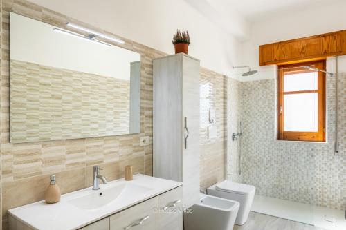 Ένα μπάνιο στο House&Villas - Villa Zagara Bianca