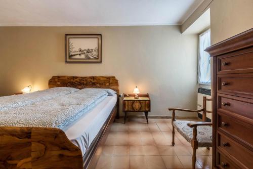 מיטה או מיטות בחדר ב-Casa Vacanze Voiandes