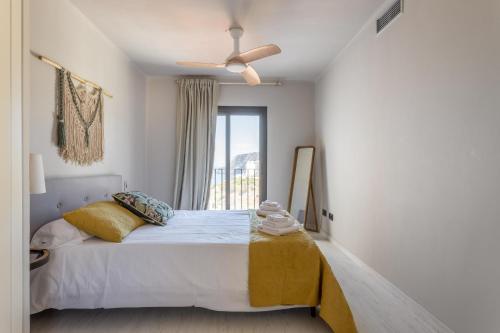 A bed or beds in a room at La Reserva