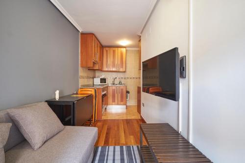 Cucina o angolo cottura di Apartamentos Madrid Atocha