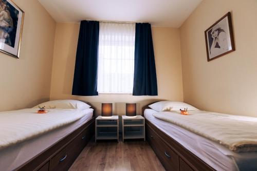 Кровать или кровати в номере Hotel Restaurant Zagreb