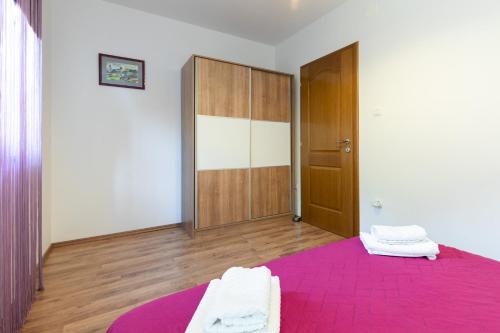 Postel nebo postele na pokoji v ubytování La Vista apartments with pool