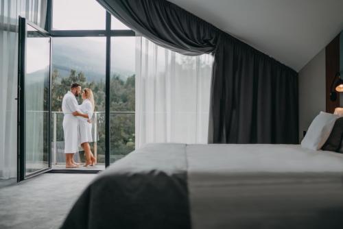 Postel nebo postele na pokoji v ubytování Green Mountain 5* Hotel